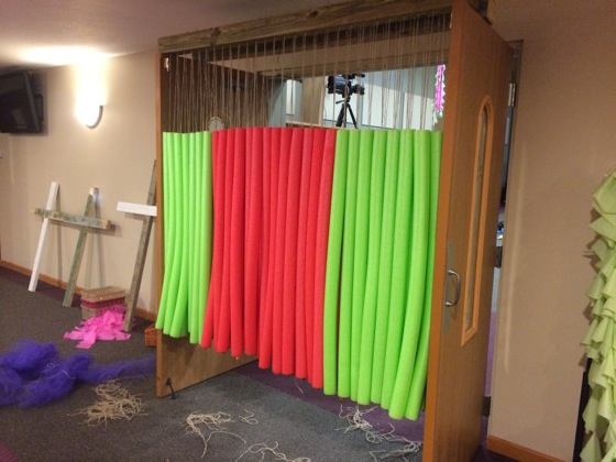 We made did this to 2 wide doorways using pool noodles hanging with twine.