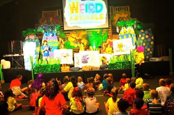 One more look at the main stage in action... with kids holding up the Bible Buddy posters, which were mounted on foam boards.