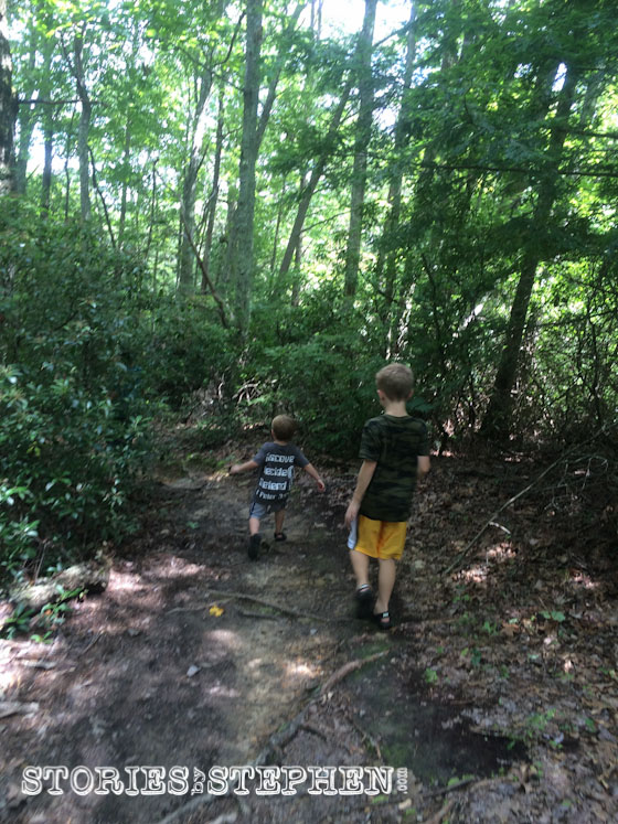 Will & Sam hiking the secret trail to Buzzard's Roost.