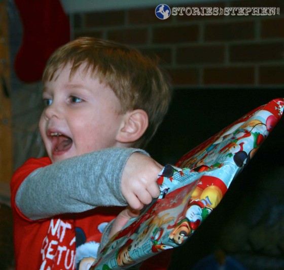 Sam was ecstatic when he saw what was inside this wrapping paper... his new iPad Mini!