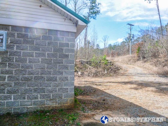 This gravel service road ends at the Seales Trail by the maintenance building. This service road runs from the Seales Trail, past the orange Lickskillet Trail, all the way to the yellow Golf Course Loop Trail.