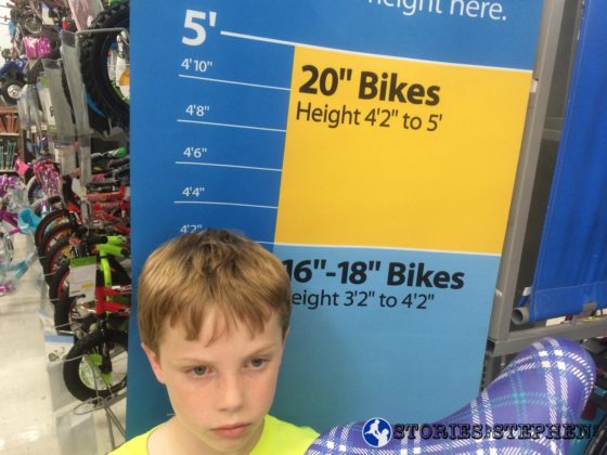 Walmart had this nifty height chart to tell us what size bike to get. Will is at the bottom of the 20" bike range, which means he can grow into it and use it for a few years.