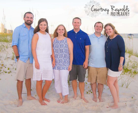 Jennifer and I are in the middle with 2 of her brothers and their wives on the outsides.. Photo Credit: Courtney Reynolds Photography